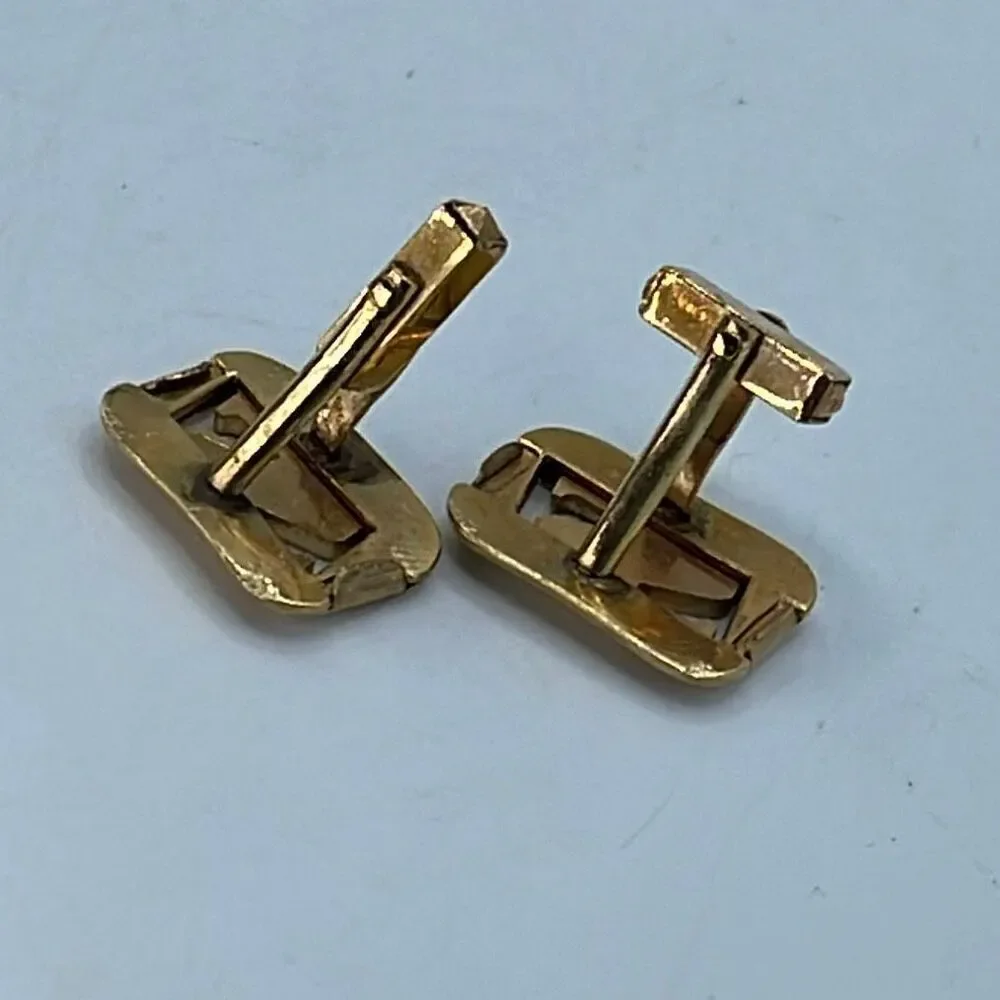 Vintage Anson gold tone shiny matte open design cufflinks.